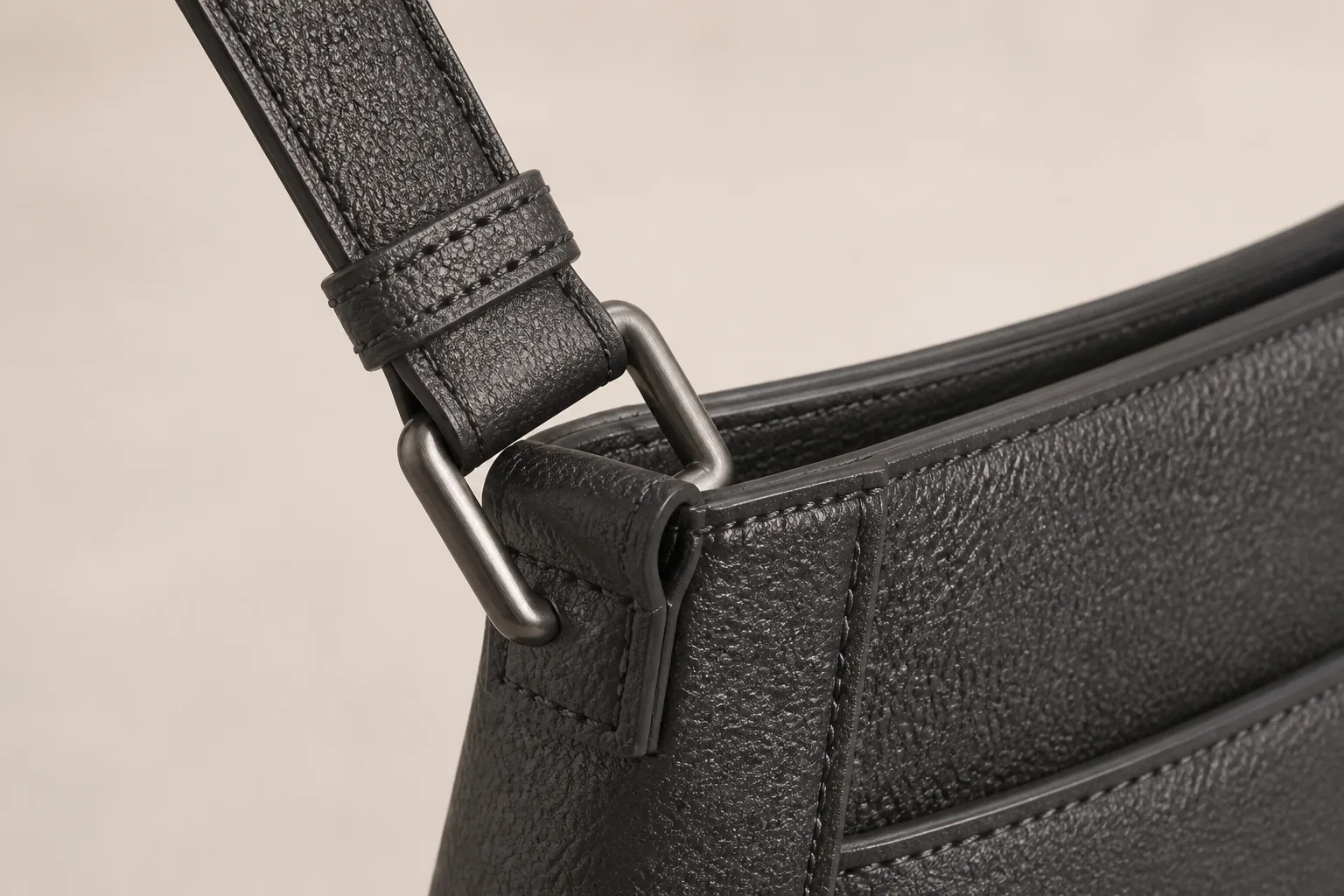 Original close study of charcoal leather and hardware